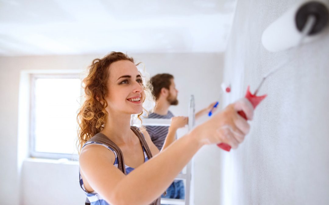 First Home buyers painting their new home